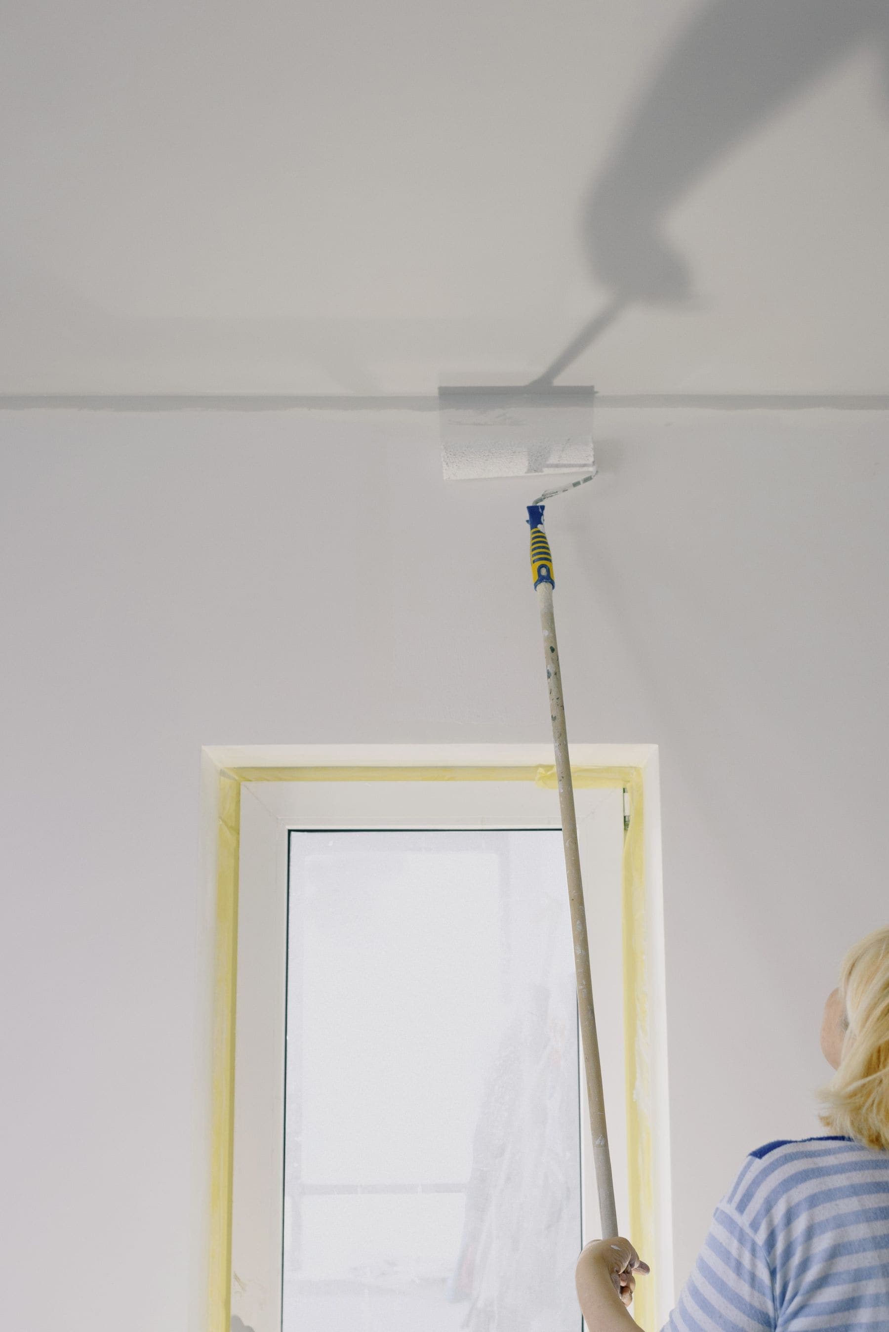 Masked and taped doorway during surface preparation