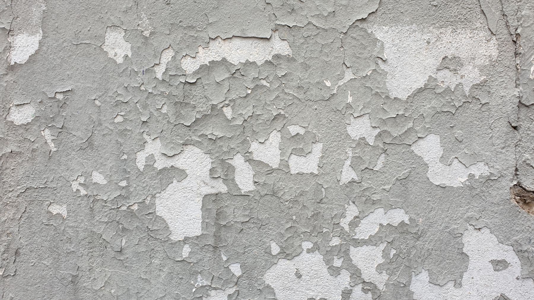 Wall surface showing paint wear building up over time