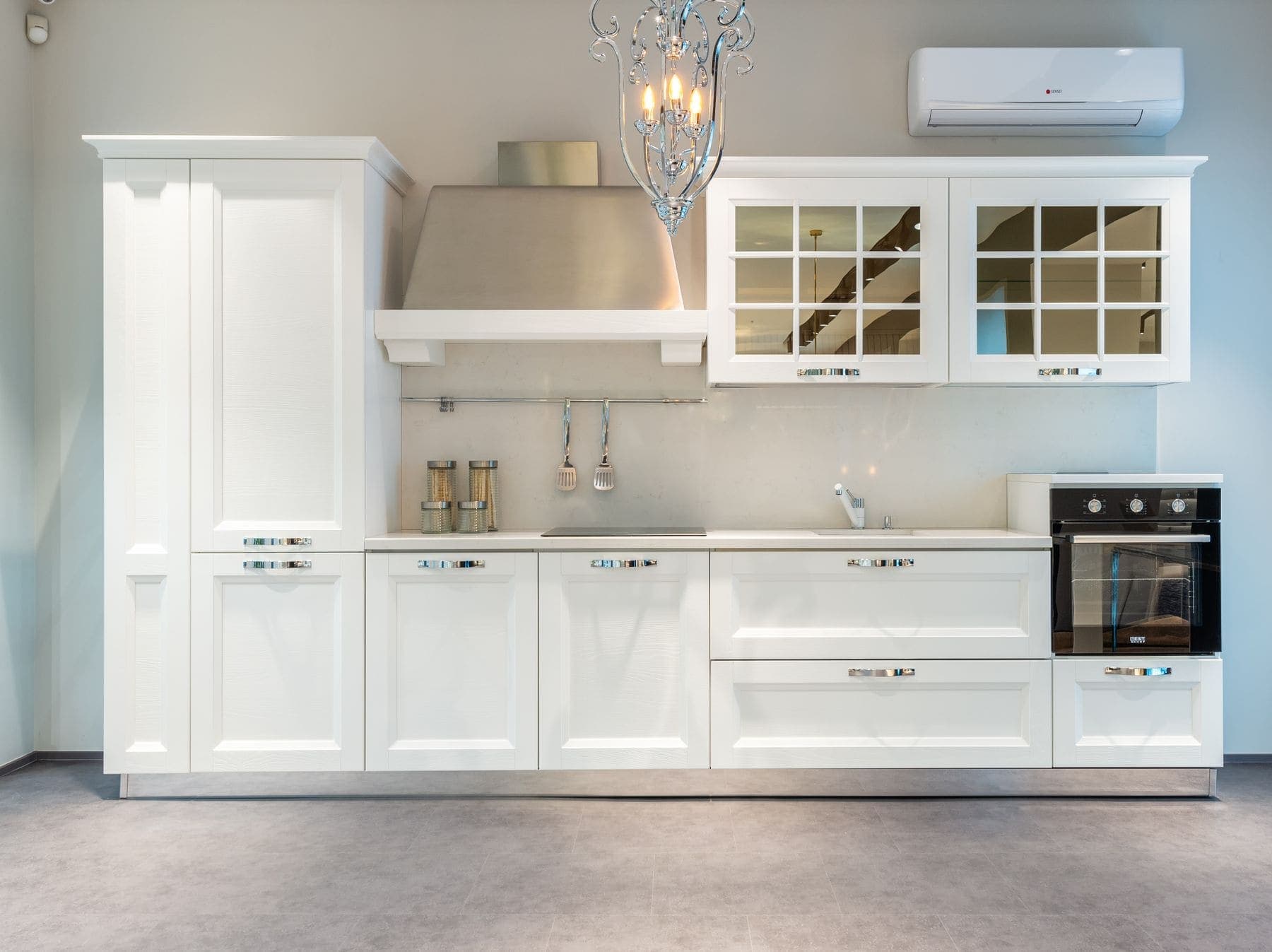 Kitchen cabinets refinished in a smooth white enamel