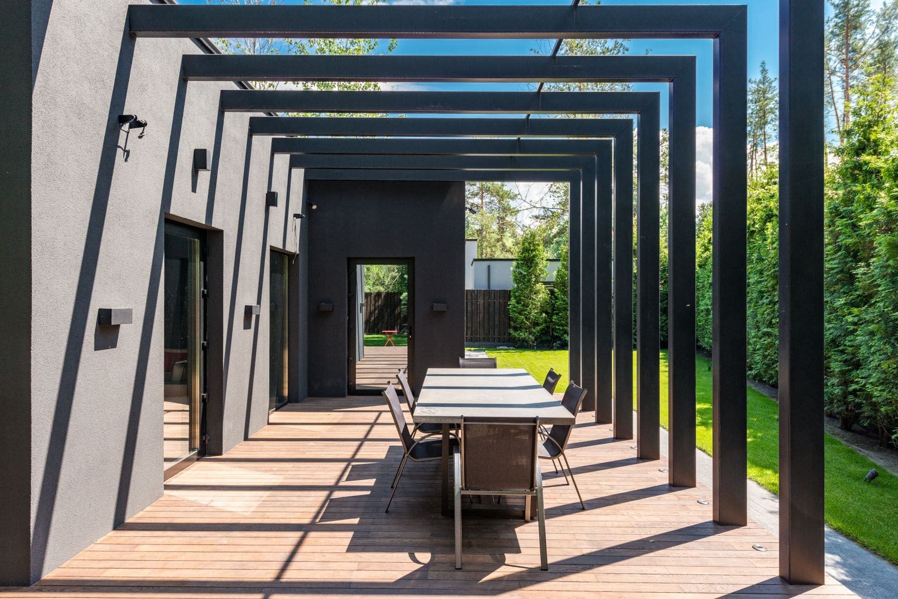 Deck & Fence Painting by Brivon — Outdoor pergola with freshly coated timber beams
