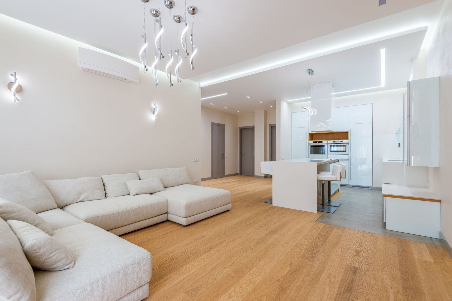 Bright open-plan living space with freshly painted walls by Brivon Painting
