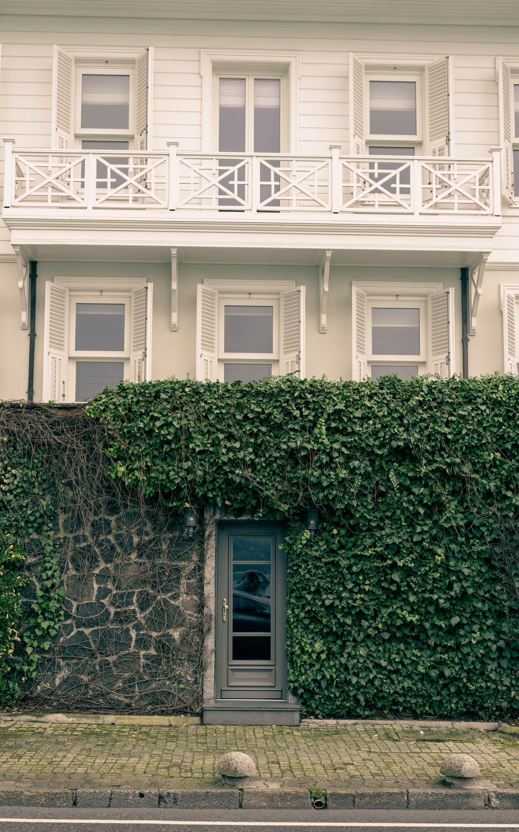 Painted eaves, trim and window detail on a period home exterior